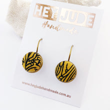 Load image into Gallery viewer, Small Bronze Bezel edge Drop Earrings-with lever arch closing back-Mustard Gold with Black line Abstract fabric button feature-Hey Jude Handmade