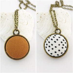 Mini Bronze Pendant Necklace-Double Sided-Fabric Features-Saffron Linen and White, Black Dots-Hey Jude Handmade