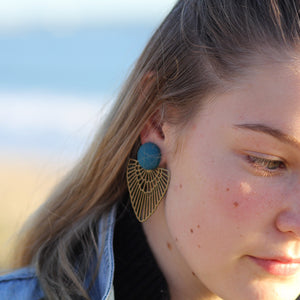 Close up model wearing Teal Stud, Bronze Fan Statement Earrings