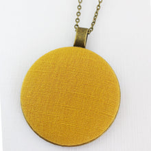 Load image into Gallery viewer, Large-Long Pendant Necklace-Antique Brass-Mustard Yellow Linen fabric feature-Bronze chain-Hey Jude Handmade