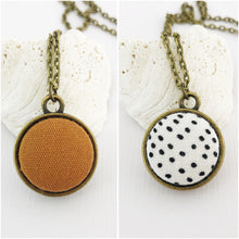 Load image into Gallery viewer, Mini Bronze Pendant Necklace-Double Sided-Fabric Features-Saffron Linen and White, Black Dots-Hey Jude Handmade