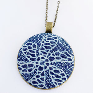 Large Pendant Necklace- fabric feature in round brass setting-Flower patterned Denim-on long bronze chain-Hey Jude Handmade