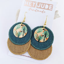 Load image into Gallery viewer, Rustic Linen Duo Dangles-Lightweight Statement Earrings- two discs of linen fabric- Pine Green + Sand coloured- with enamel painted copper embellishments with parrots- gold coloured ear wires-Hey Jude Handmade